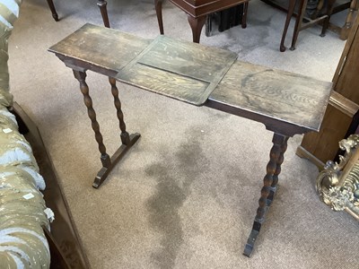 Lot 2889 - An early 20th century oak reading table, with...