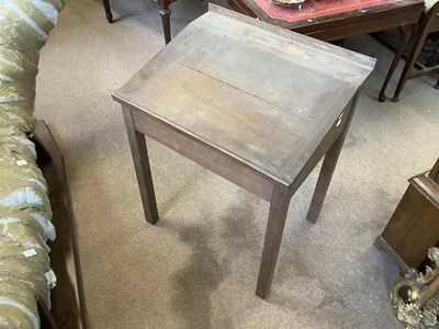 Lot 2914 - An early 20th century child's oak desk, on...