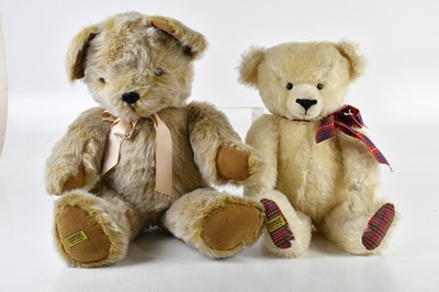 Lot 1145 - MERRYTHOUGHT; two large teddy bears, largest...