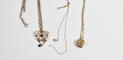 Lot 1450 - A 9ct gold modern heart shaped pendant locket...