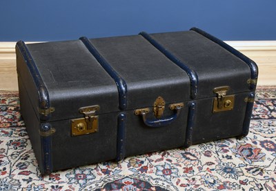 Lot 167 - A vintage blue wooden bound travelling trunk.