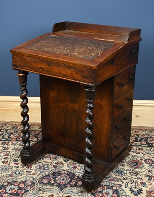 Lot 2793 - A 19th century rosewood veneered Davenport...