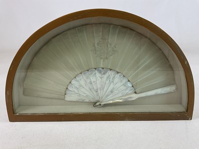 Lot 75 - A mother of pearl handled fan, with...