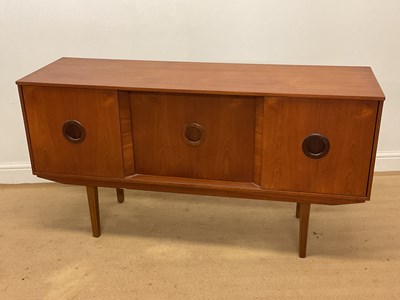 Lot 436 - A mid 20th century teak sideboard with three...