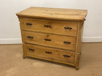 Lot 446 - A pine chest with three drawers and matching...