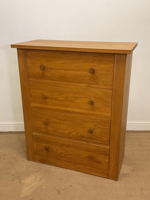 Lot 458 - A modern oak chest of four drawers, height...