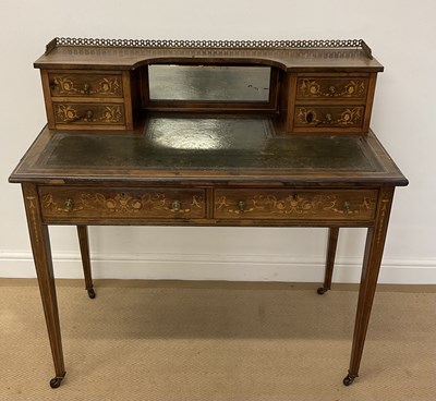 Lot 426 - MAPLE & CO; an Edwardian desk with a galleried...