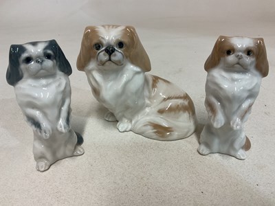 Lot 167 - ROYAL COPENHAGEN; three Pekingese dogs...