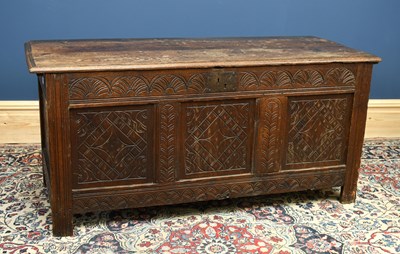 Lot 2954 - An 18th century oak coffer with carved and...