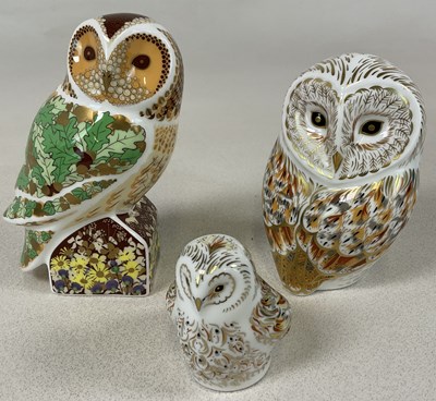 Lot 152 - ROYAL CROWN DERBY; three boxed owl paperweight...