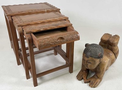 Lot 506 - A nest of three carved teak tables, smallest...