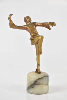 Lot 712 - An Art Deco patinated spelter figure...