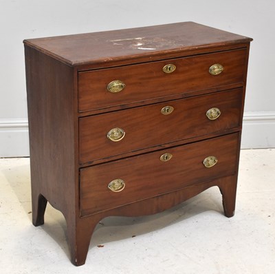 Lot 1134 - A 19th century mahogany chest of three long...