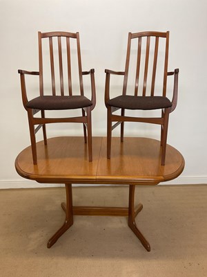 Lot 470 - A pair of 1970s teak carvers and a teak...