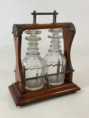 Lot 209 - A 19th century two bottle decanter oak and...