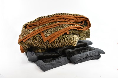 Lot 681 - PATRICK FREY; a large faux leopard skin bed...