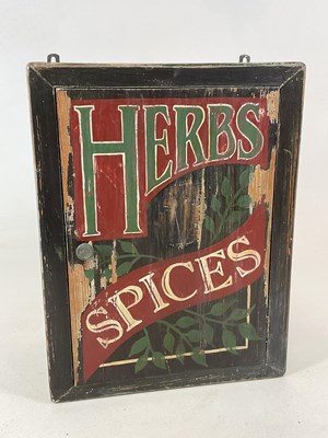 Lot 407 - A handpainted pine wall hanging herbs and...