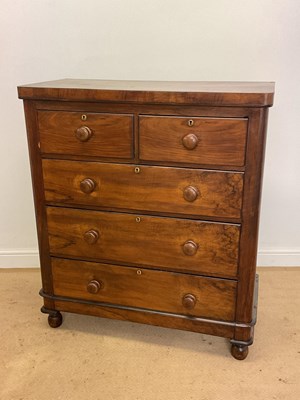 Lot 430 - A 19th century mahogany chest of three long...