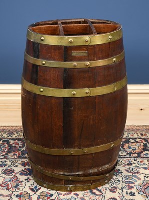 Lot 2818 - A brass bound teak barrel shaped stick stand,...