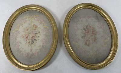 Lot 76 - A pair of oval gilt framed floral tapestries,...