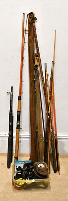 Lot 1215 - PALAKONA; a three piece split cane fishing rod,...