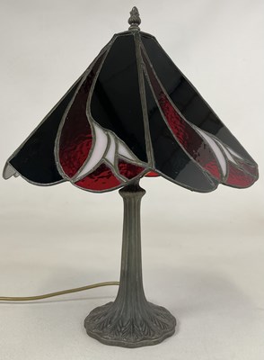 Lot 353 - A Tiffany style red and black glass table lamp...