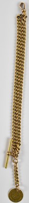 Lot 1606 - An 18ct gold watch chain, with T-bar and...