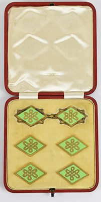 Lot 1136 - A cased set of six gilt metal and green...