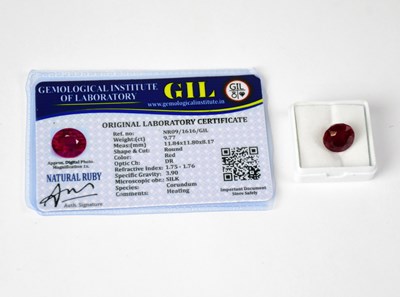 Lot 1146 - A loose 9.77 carat round ruby with GIL...