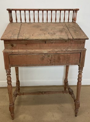 Lot 454 - A pine clerk's desk with guard rail and...