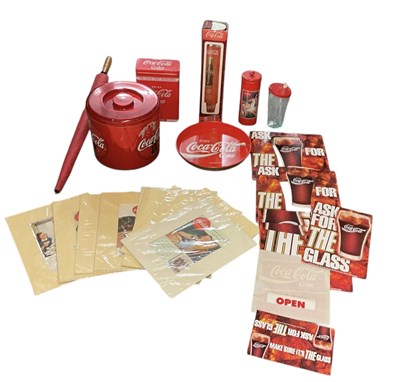 Lot 322 - COCA-COLA INTEREST; a modern tin Coca-Cola...