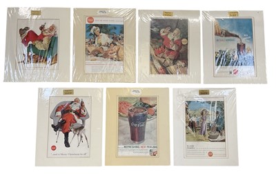 Lot 334 - COCA-COLA INTEREST; a set of seven vintage...