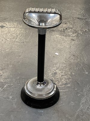 Lot 353 - A 1930s Art Deco chrome and bakelite ashtray,...