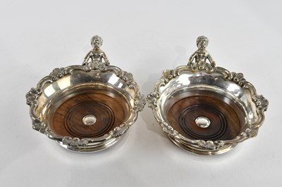 Lot 14 - A pair of Florentine silver plated bottle...