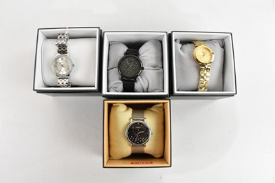 Lot 673 - TIMEX; four gentleman’s wristwatches,...