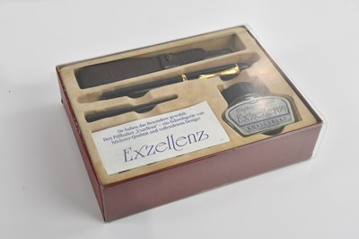 Lot 601 - EXZELLENZ; a vintage fountain pen set, the...