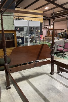 Lot 392 - A mahogany four poster bed, with shaped...