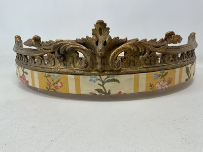 Lot 453 - A gilded demi-lune bed canopy, with pierced...