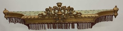 Lot 416 - A gilded bed canopy, with floral urn pierced...