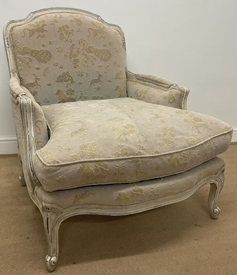 Lot 396 - An oversized French cream painted upholstered...