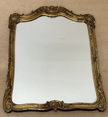 Lot 435 - A late 19th century gilt framed shaped...