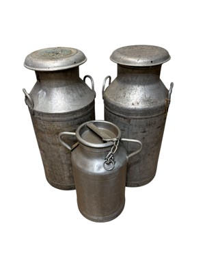 Lot 364 - Three vintage galvenised milk churns,...