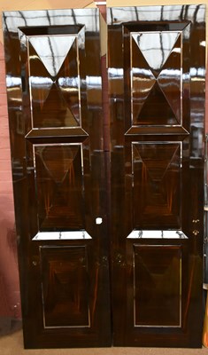 Lot 2693 - A large pair of coromandel veneered doors,...