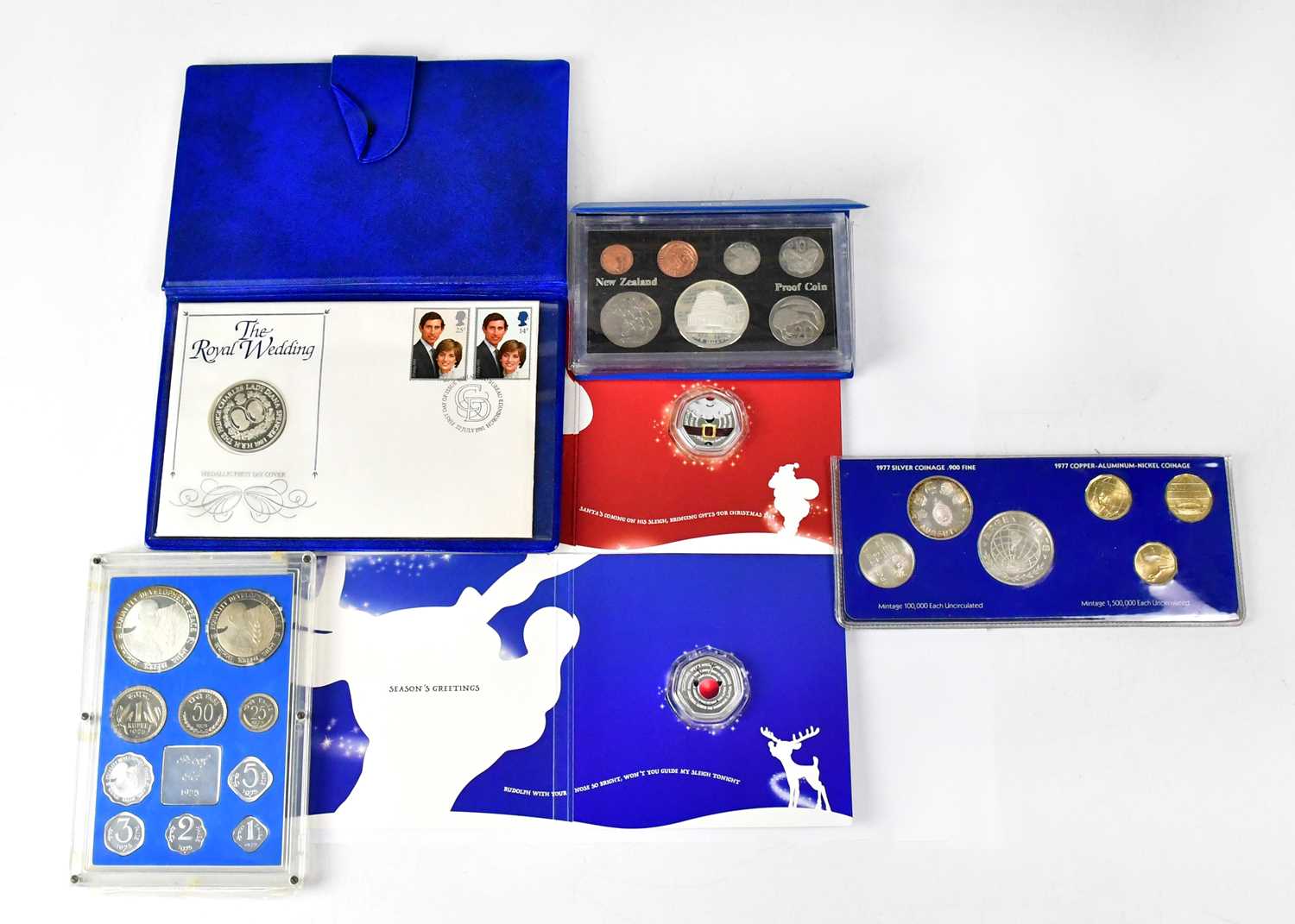 Lot 692 - Two silver 50p coins, 2020, proof coin sets...