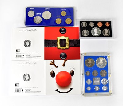 Lot 692 - Two silver 50p coins, 2020, proof coin sets...