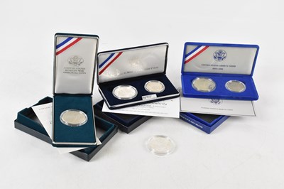 Lot 636 - UNITED STATES LIBERTY COINS; a cased silver...