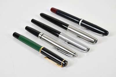 Lot 611 - Five fountain pens comprising a Pelikan with...