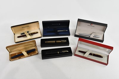 Lot 619 - SHEAFFER; a collection of seven fountain pens,...