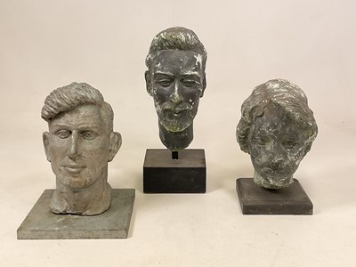 Lot 4 - Three 20th century plaster head busts mounted...