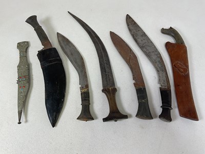 Lot 48 - Four Gurkha kukri knives (one with leather...